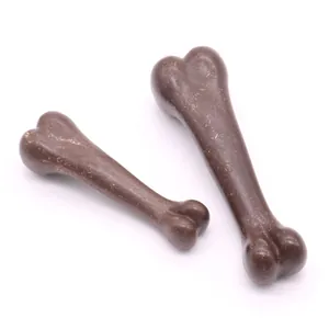 Juguete masticable duradero para perros con sabor a carne en forma de hueso real.