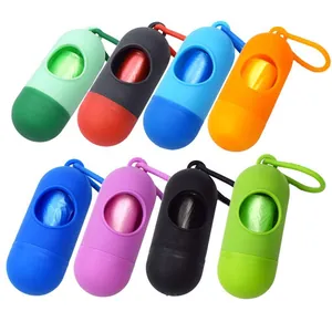 Distributore di sacchetti per deiezioni di animali a forma di capsula in vari colori vivaci