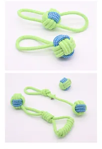Detailed view of durable green and blue cotton rope dog toys for dental cleaning