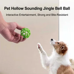 Durable green hollow pet toy ball with built-in bell for dogs