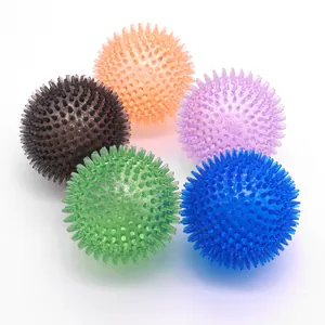 Set of five colorful TPR spiky balls for dogs, durable and bouncy interactive pet toys.