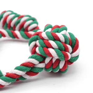 Christmas themed red and green braided cotton rope knot dog toy for tug of war and chewing