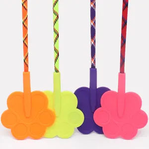 Vibrant neon paw-shaped pet training paddles for professional dog behavior correction