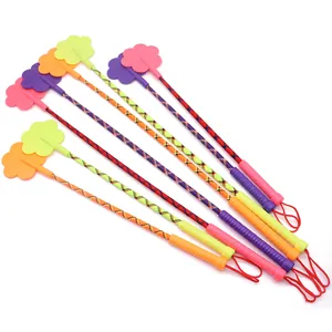 Set of colorful pet training sticks with paw-shaped heads and flexible braided shafts for dogs