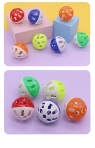 Detailed view of colorful hollow plastic cat toy balls with built-in jingle bells