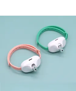 Automatic laser cat collar toys in pink and green, USB rechargeable for indoor cats.