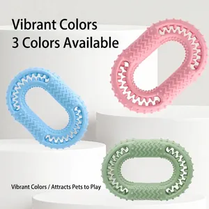 Juguetes masticables ovalados para perros en azul, rosa y verde, limpieza dental