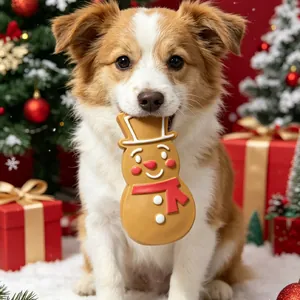 Schattige hond met kerstmis peperkoekmannetje piepend latex hondenspeeltje voor feestplezier
