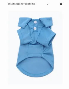 Close-up detail of the breathable light blue mesh fabric on a pet polo shirt with buttons