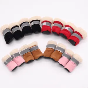 Botas de nieve cálidas para perros, antideslizantes, con forro de piel y correas reflectantes de seguridad.