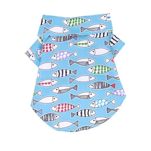 Light blue summer pet beach shirt with vibrant colorful fish pattern for dogs and cats