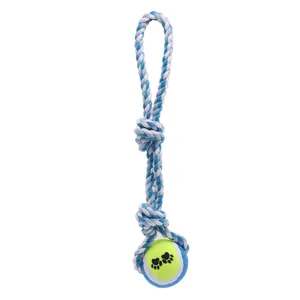 Braided cotton rope dog chew toy with a tennis ball featuring cute paw patterns
