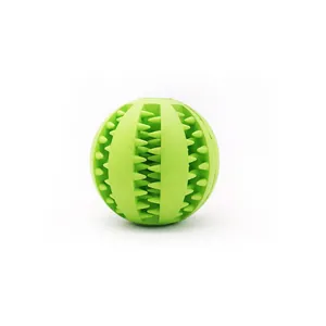 Durable green rubber dog toy ball with teeth cleaning texture