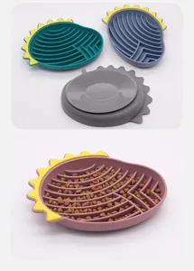 Detailed view of silicone slow feeder bowl with kibble and suction cup base for dogs
