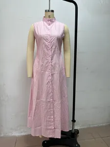 Detail of a pink sleeveless stand-collar button-down maxi dress on a mannequin