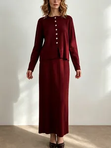 Elegant burgundy knit cardigan and vertical stripe long skirt two-piece set for women