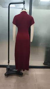 Elegant burgundy mock neck long dress for women shown from the back on a mannequin