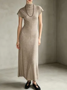 Elegant beige semi-high neck maxi dress with short sleeves shown on a model