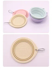 Detail view of collapsible silicone pet bowl with portable carabiner for travel