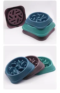 Detailed view of stackable pet slow feeder bowls in blue, purple and teal shades.
