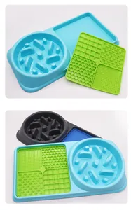 Double-functional pet slow feeder bowl set with multi-textured silicone lick mat for dogs