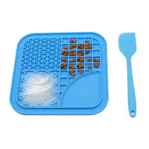 Blue silicone pet lick mat and spatula set for slow feeding with non-slip suction cups