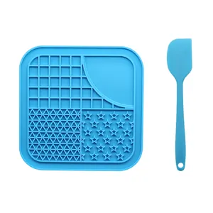 Blue silicone pet lick mat and spatula set for slow feeding dogs and cats