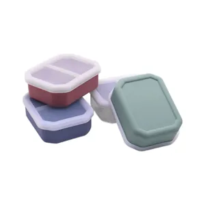 Durable set of four colorful silicone pet food storage boxes with airtight lids.