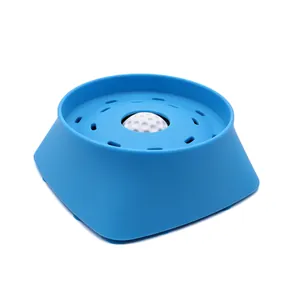 Blue silicone pet slow feeder bowl with rolling ball for dogs and cats, anti-slip base