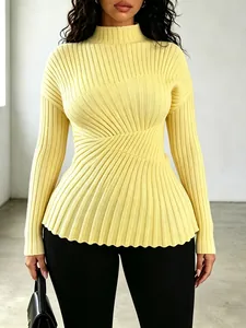 Close-up of pale yellow ribbed knit sweater with unique twisted front design detail