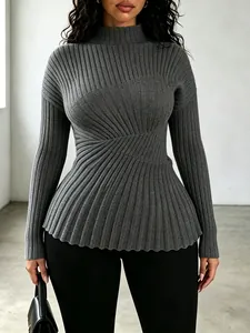 Detail view of grey ribbed knit sweater featuring unique pleated waist and high neck