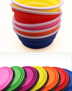 Detailed view of colorful collapsible silicone pet bowls in expanded and flat states
