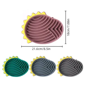 Dinosaur shaped silicone slow feeder dog bowl with dimensions 21.6x18cm