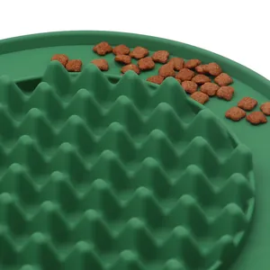 Green silicone slow feeder mat for dogs with wave-like textured surface
