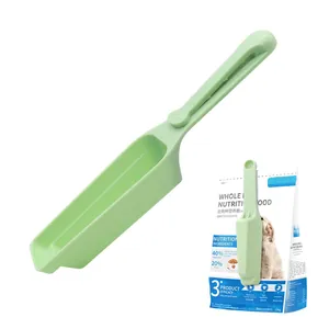 Light green plastic pet food scoop with integrated sealing clip for dog and cat food bags