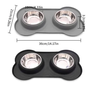 Detailed view of bone-shaped silicone pet mat with dual stainless steel bowls and dimensions.