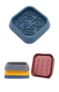 Detail of silicone slow feeder bowl showing maze interior and suction cup base.