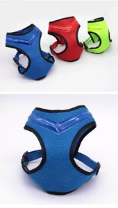 Detail view of breathable mesh LED dog harness showing multiple colors and front buckle.