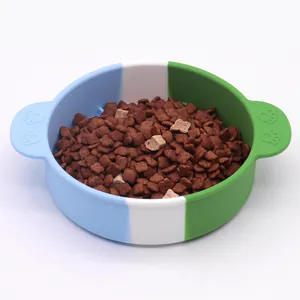Three-color silicone pet slow feeder bowl filled with kibble to prevent choking in dogs