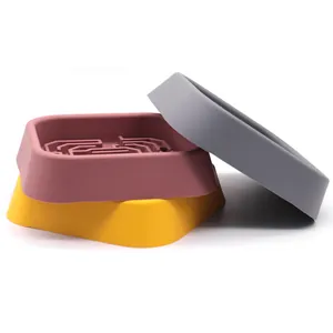 Set of three colorful silicone slow feeder dog bowls with maze anti-choke design