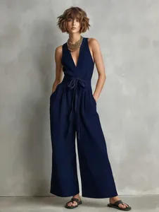 Elegante marineblauwe mouwloze jumpsuit met V-hals en taileband voor dames in de zomer