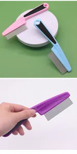 Stainless steel fine-tooth pet flea comb shown in multiple colors with ergonomic handle