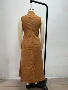 Back view of minimalist brown sleeveless maxi dress on a mannequin display