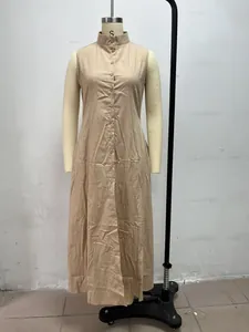 Minimalist khaki sleeveless maxi dress with stand collar and button-down front.