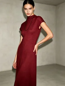 Elegant burgundy mock neck maxi dress featuring a minimalist vintage chic silhouette