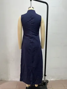 Back view of minimalist navy sleeveless maxi dress with mandarin collar on mannequin