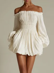 Detailed view of cream off-shoulder pleated mini dress with long puff sleeves