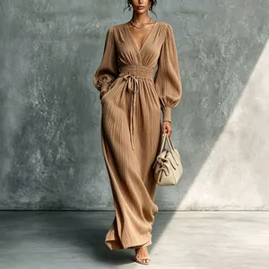 Elegant camel pleated maxi dress featuring a V-neck and cinched waist detailing