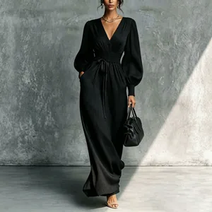 Elegant black pleated long sleeve maxi dress featuring V-neck and cinched waist design