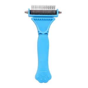 Blue double-sided pet dematting comb for dogs and cats with paw-shaped handle